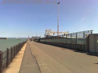 Dover Hoverport being demolished, June 2009 - Looking along the length of the Prince of Wales Pier, the hoverport to the right and the Seacat gantry visible beyond the green fences (James Rowson).